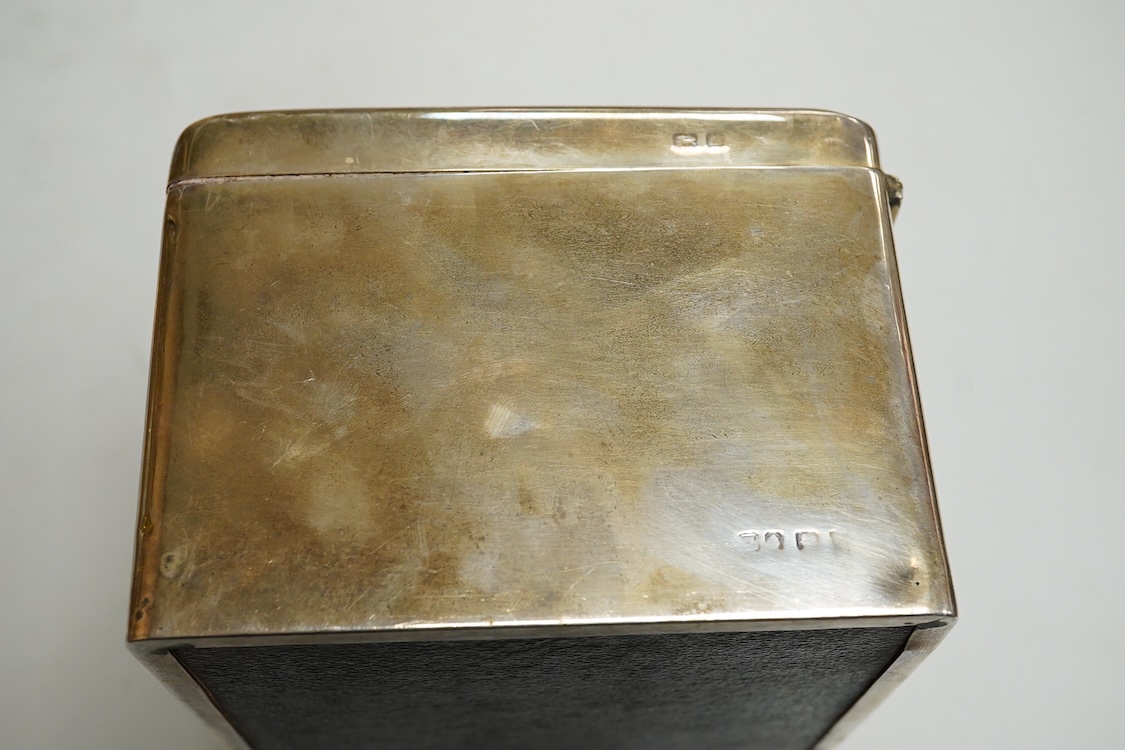 A 1930's silver mounted cigarette box, hallmarks rubbed, length 15.6cm, height 9cm.